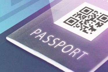 Illustration of a passport with a QR code on its cover, representing the digital product passport