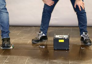 In-situ testing using a GMG 200 mobile tribometer. The tribometer is drawn across the floor on sliders fitted with a range of footwear materials