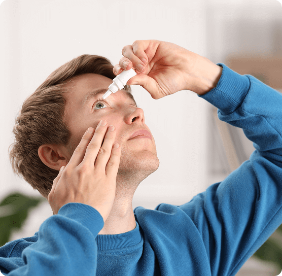 Patient smiling after her eye appointment with her local eye doctor