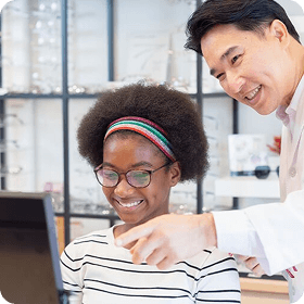a young girl doing a glasses fitting with an optometrist